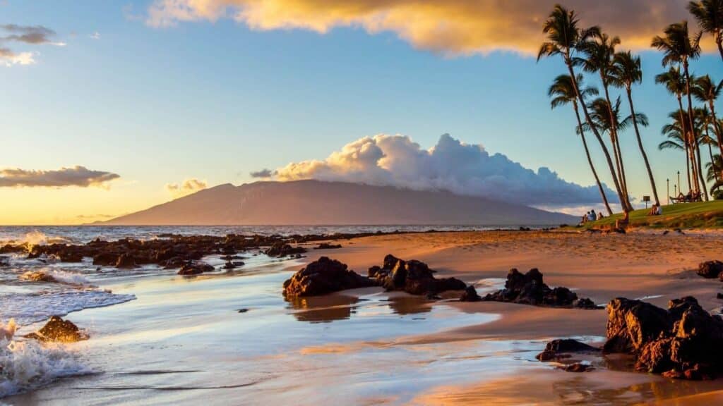 Luxury oceanfront stay on Kaanapali Beach in Maui with scenic island views for nonprofit fundraising auctions.