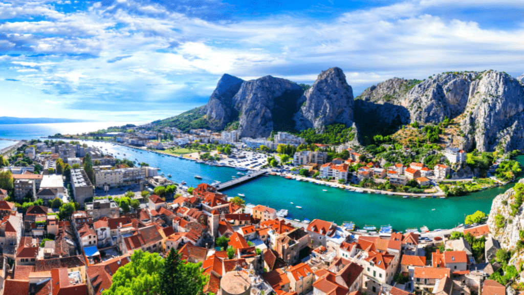 Panoramic view of Omis, Croatia, surrounded by mountains and the Adriatic coastline