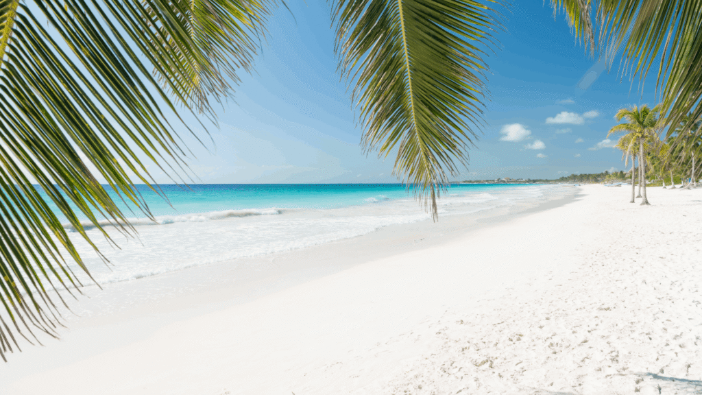 Quiet white-sand beach and turquoise sea in Quintana Roo